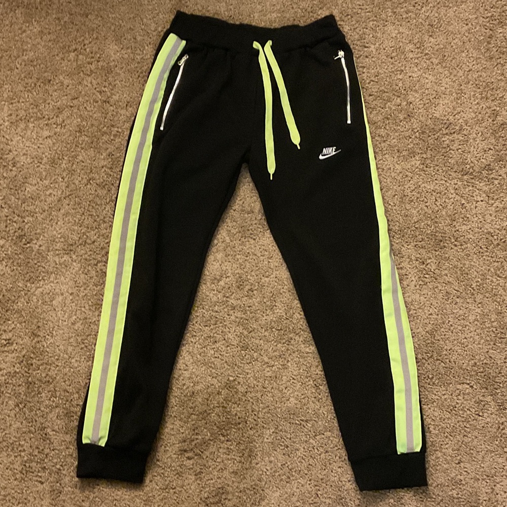 Nike Black Joggers with Neon Yellow Side Stripes